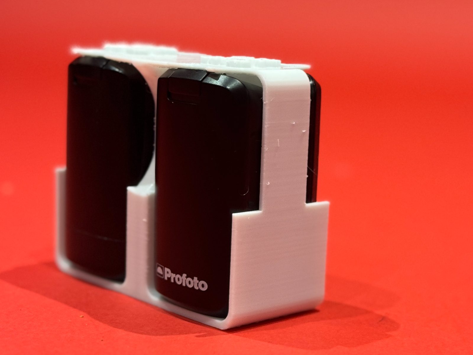 #16 Profoto A1 & A2 Battery Holder (4 Batteries) — vue 3