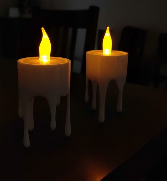 #28 Floating dripping candle – LED tealight holder — vue 2