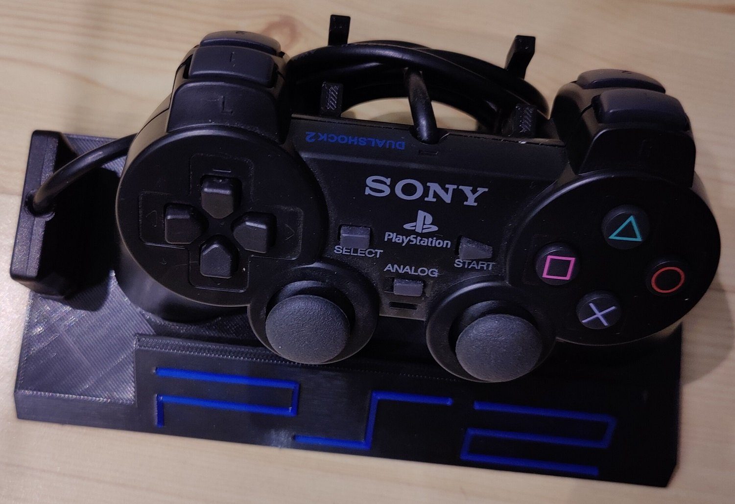 #67 PS2 Controller Stand With Playstation 2 Logo — vue 3