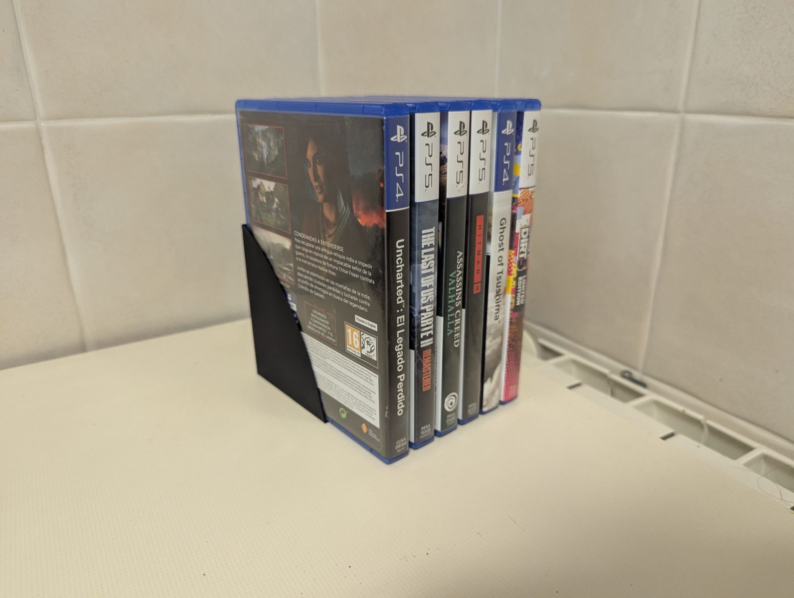 #74 Invisible Bluray PS5 PS4 games holder — vue 3