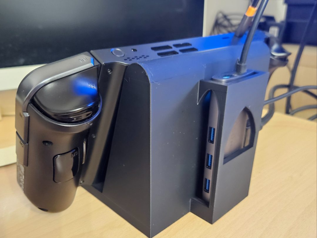 #114 Dock Handheld — vue 1