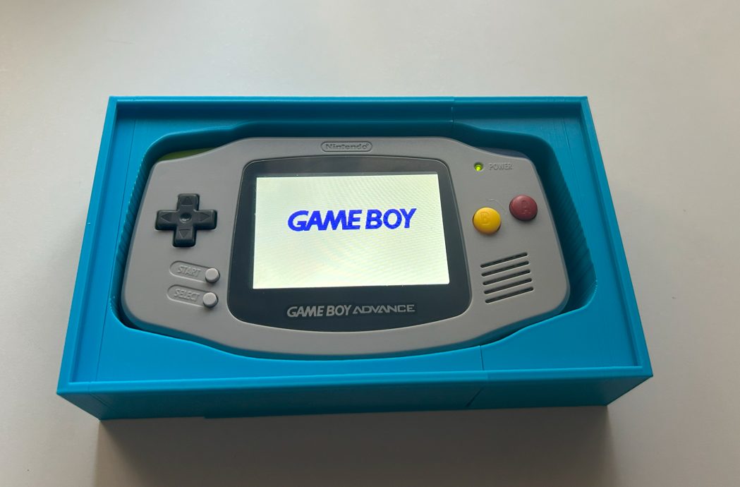 #232 Cuadro Expositor Game Boy Advance — vue 3